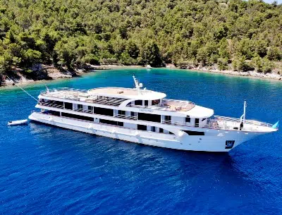 Memories ship exterior with green island background